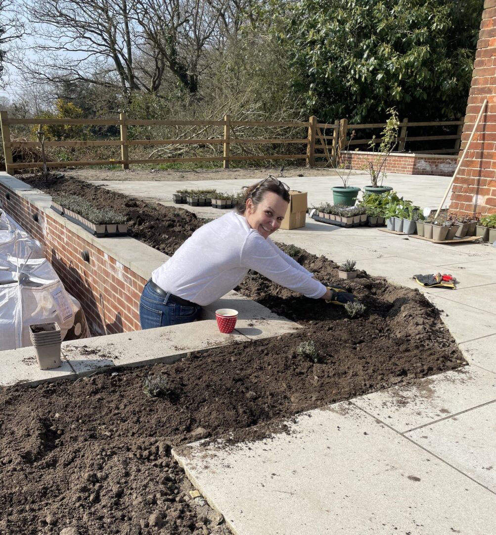 A woman is working in the garden