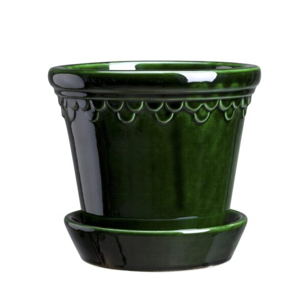 A green ceramic planter with a black rim.