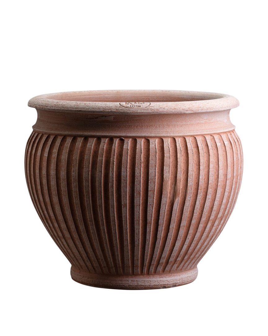 A brown vase with a pattern on it.