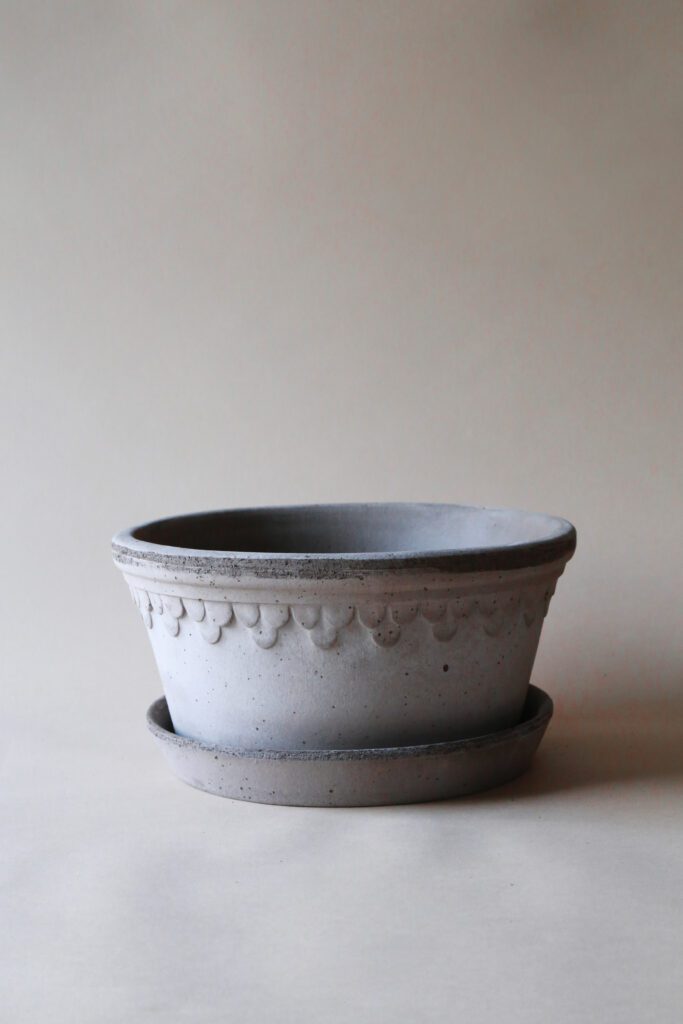 A white bowl sitting on top of a table.