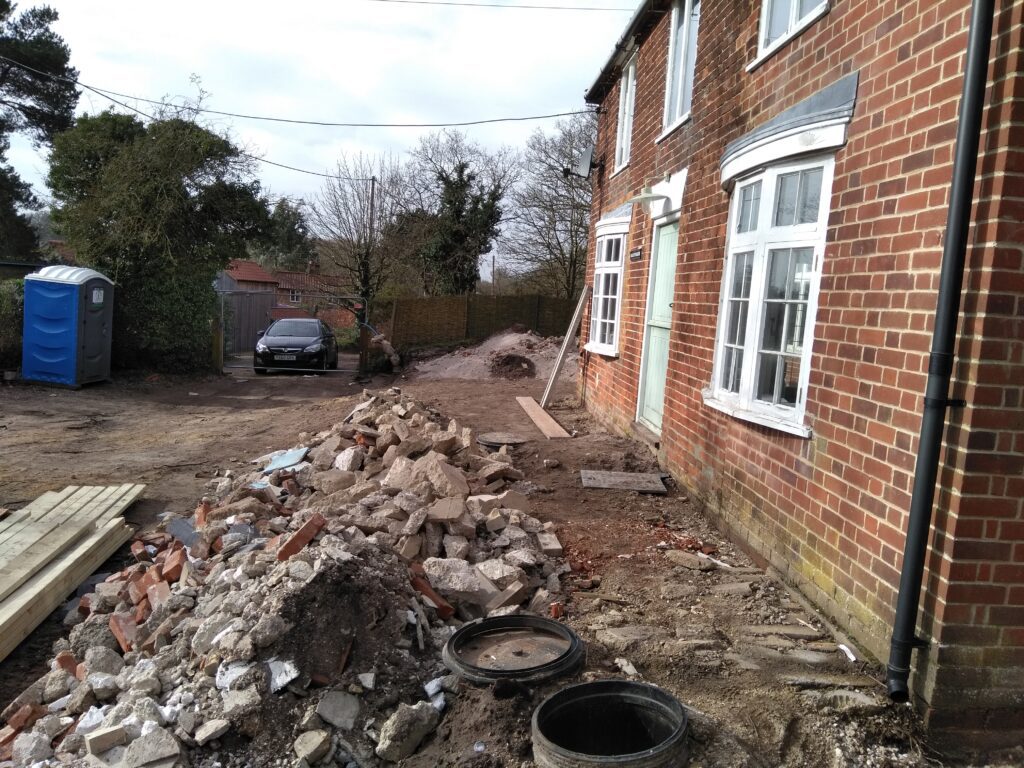 A house that has been demolished and is being remodeled.