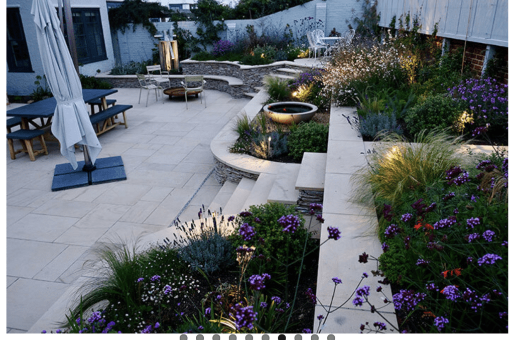 A patio with flowers and plants in it